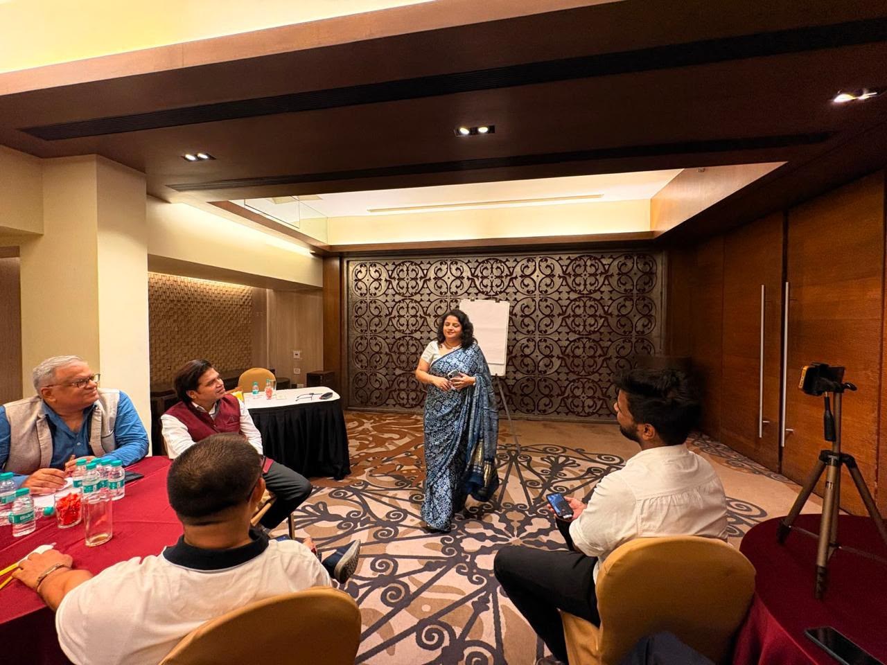 Shipra leading an intimate professional workshop